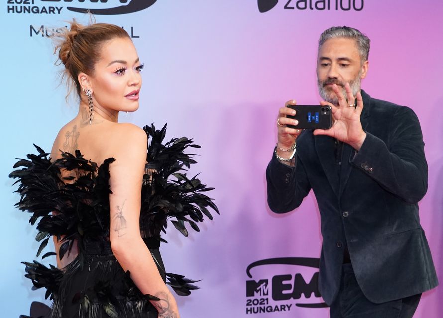 Rita Ora, with her husband Taika Waititi, cancelled a festival appearance hours before she was due to attend (Ian West/PA)