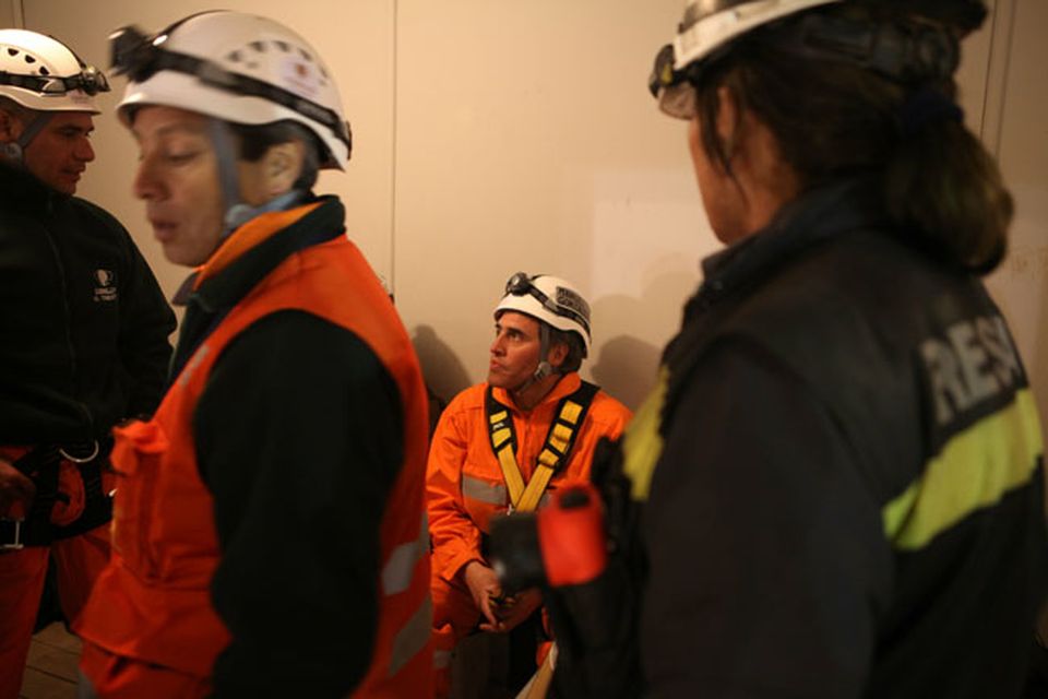 SAN JOSE MINE, CHILE - OCTOBER 12: (NO SALES, NO ARCHIVE) In this handout from the Chilean government, Manuel Gonzalez, a rescue specialist from Codelco, prepares to be the first rescuer lowered into the mine in the unmanned rescue capsule October 12, 2010 at the San Jose mine near Copiapo, Chile. The rescue operation could begin bringing up the 33 miners tonight, 69 days after the August 5th collapse that trapped them half a mile underground. (Photo by Hugo Infante/Chilean Government via Getty Images)