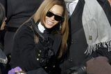 thumbnail: Jay-Z and Beyonce try to find their seats as they arrive for the inauguration ceremony at the U.S. Capitol in Washington, Tuesday, Jan. 20, 2009.  (AP Photo/Jae C. Hong)