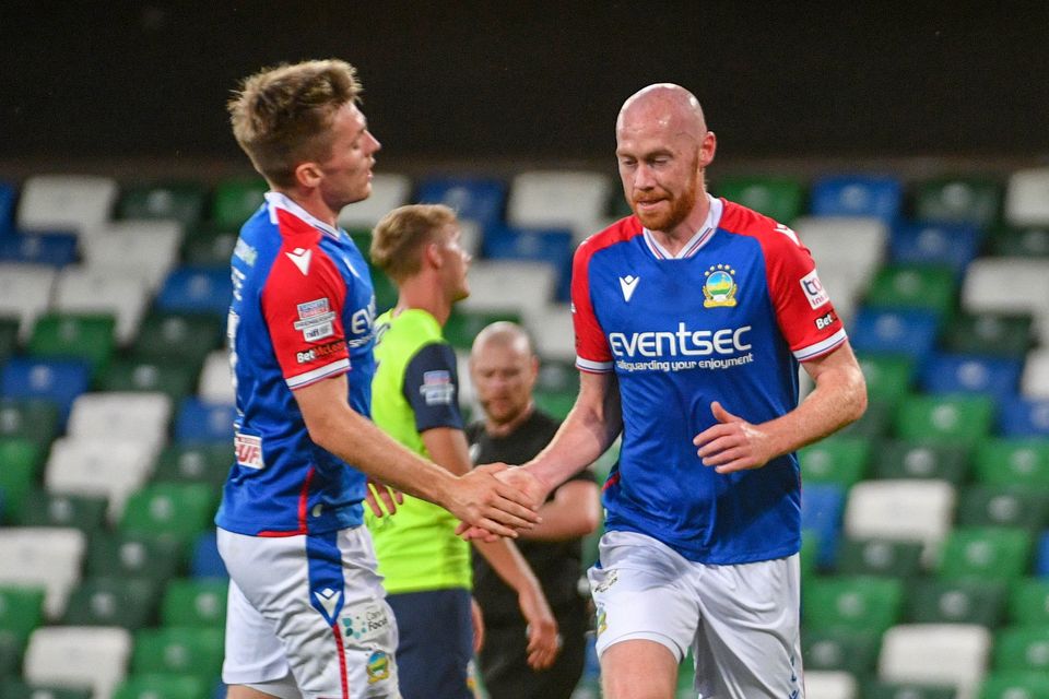 Chris Shields after scoring Linfield's fourth from the penalty spot