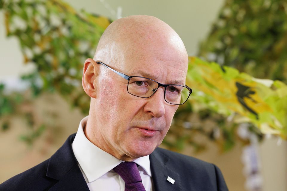 First Minister John Swinney urged support for his Government’s Budget (Robert Perry/PA)