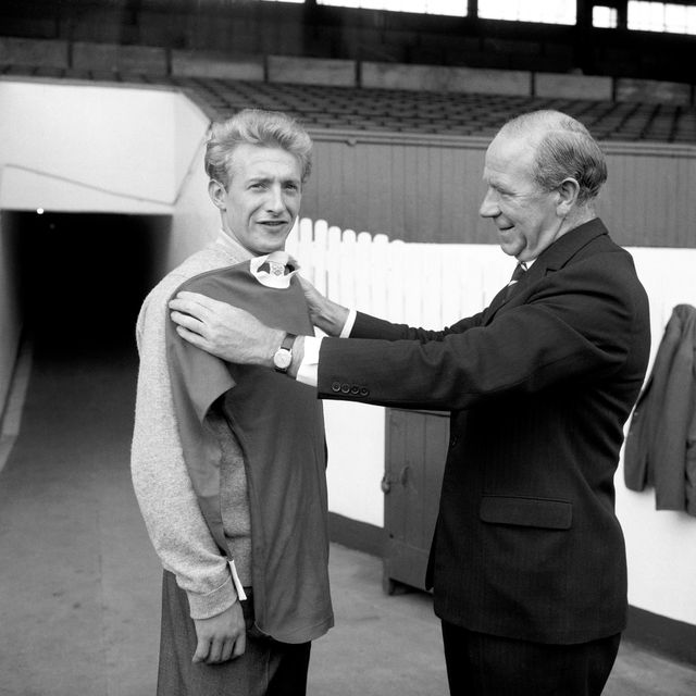 Law with Manchester United manager Matt Busby after joining the club from Torino (PA)