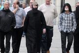 thumbnail: Loyalist campaigner Willie Frazer appears at Belfast Laganiside Courts in relation to his flag protest charges dressed as Muslim Cleric Abu Hamza.  Willie Frazer arrives at court with his supporters including Jim Dawson (right) and Jamie Bryson (second from right)