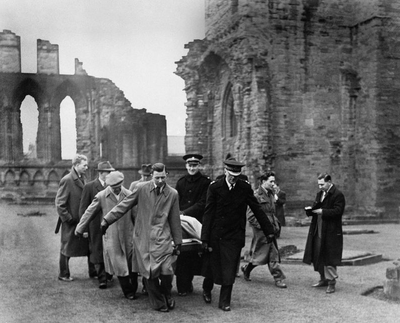 The Stone of Destiny being removed from Arbroath Abbey in 1951 after it was taken there by students trying to advance the cause of Scottish independence (PA)