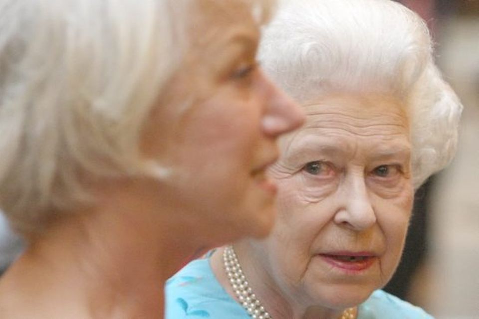 Queen Elizabeth II meets Dame Helen Mirren at a reception to celebrate young people in the performing arts, at Buckingham Palace
