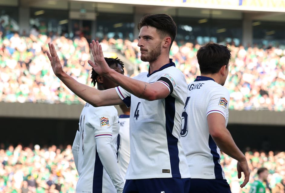 Declan Rice holds up his hands after scoring England’s opener (Evan Treacy/PA).