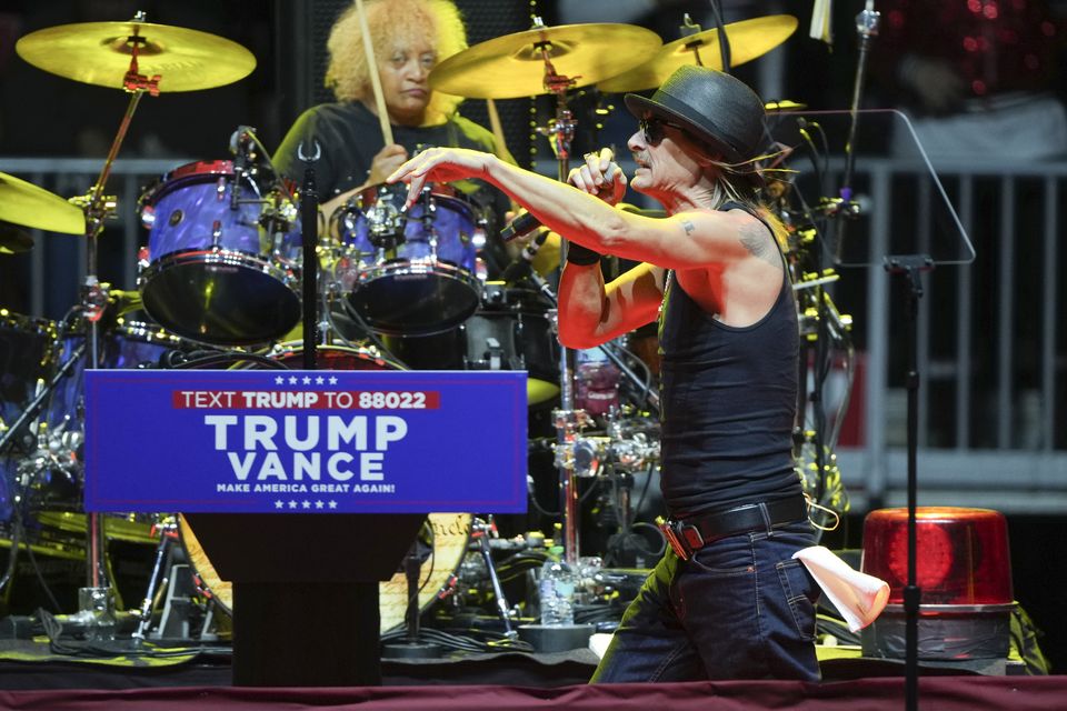 Kid Rock performs before President-elect Donald Trump arrives to speak at a rally ahead of the 60th presidential inauguration in Washington (Matt Rourke/AP)