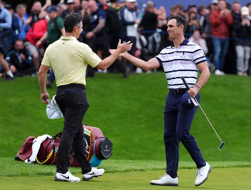 Rory McIlroy congratulates Billy Horschel following a play-off for the BMW PGA Championship at Wentworth (Zac Goodwin/PA)