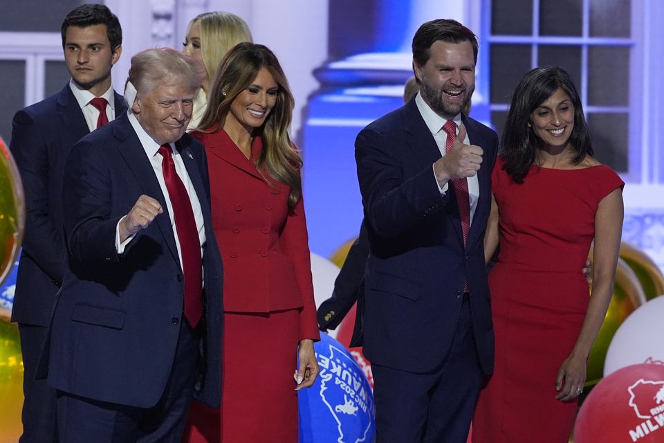 Republican presidential candidate Donald Trump, former first lady Melania Trump, Republican vice presidential candidate Senator JD Vance and his wife Usha Vance at the end of the Republican National Convention in Milwaukee (J Scott Applewhite/AP)