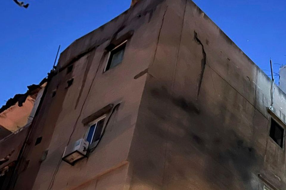 A damaged building that was hit by an Israeli airstrike in the southern suburbs of Beirut, Lebanon (Hussein Malla/AP)