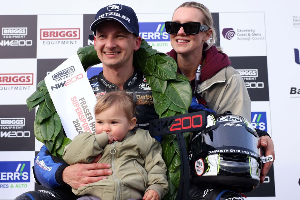 Richard Cooper celebrates winning this evenings first Supersport race with wife Danni and daughter Roxie-Rae