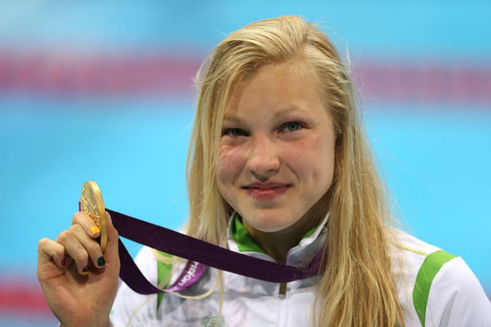 Lithuania's Ruta Meilutyte on the podium after collecting her gold medal in the Women's 100m Breaststroke Final at the Aquatics Centre in the Olympic Park, London, on the third day of the London 2012 Olympics. PRESS ASSOCIATION Photo. Picture date: Monday July 30, 2012. Photo credit should read: Tony Marshall/PA Wire. EDITORIAL USE ONLY