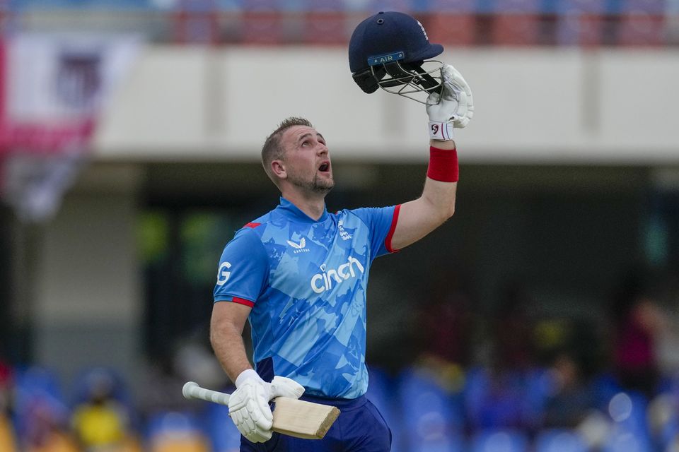 Liam Livingstone looks to the sky after reaching his hundred in memory of his grandfather Brian, who died in June (Ricardo Mazalan/AP)