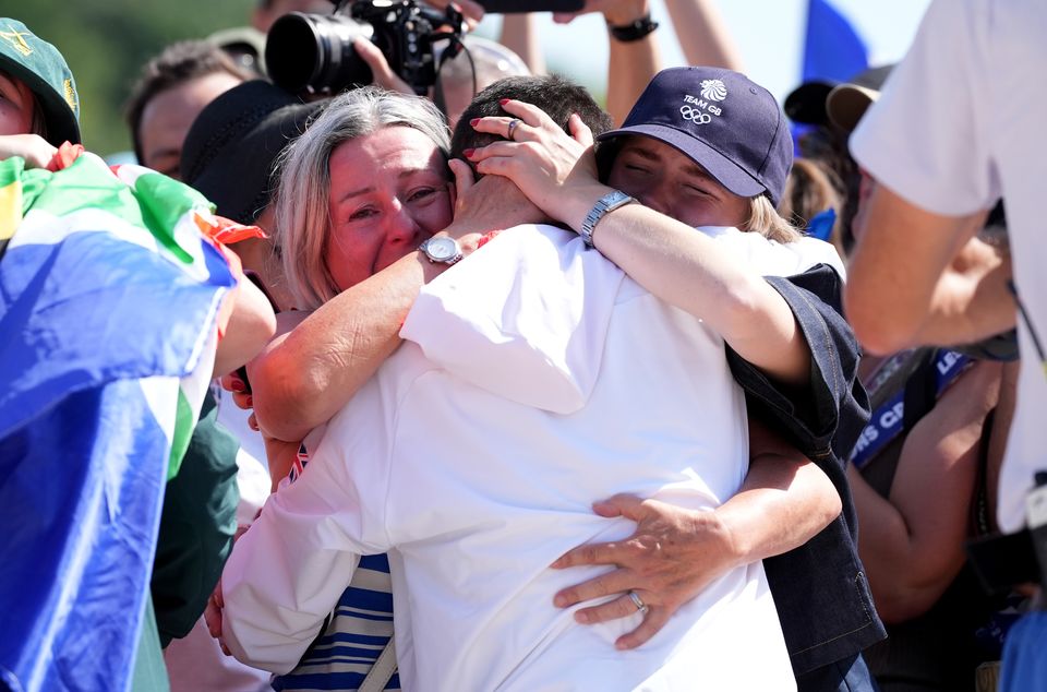 Tom Pidcock was congratulated by his family and his partner Bethany Louise Zajac (Martin Rickett/PA)