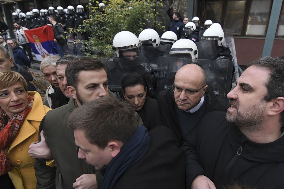 Opposition protesters are demanding arrests over a deadly roof collapse at a railway station in Novi Sad (AP)