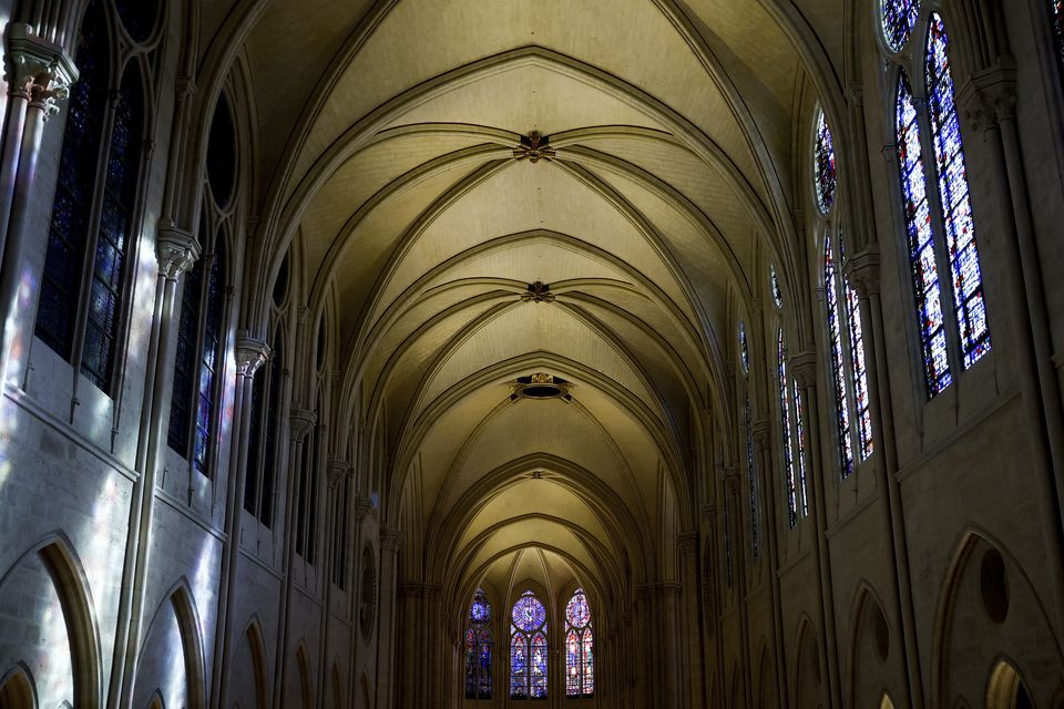 The vaulted ceiling has been fully restored – a marked contrast to the devastation that shocked the world in 2019 (AP)