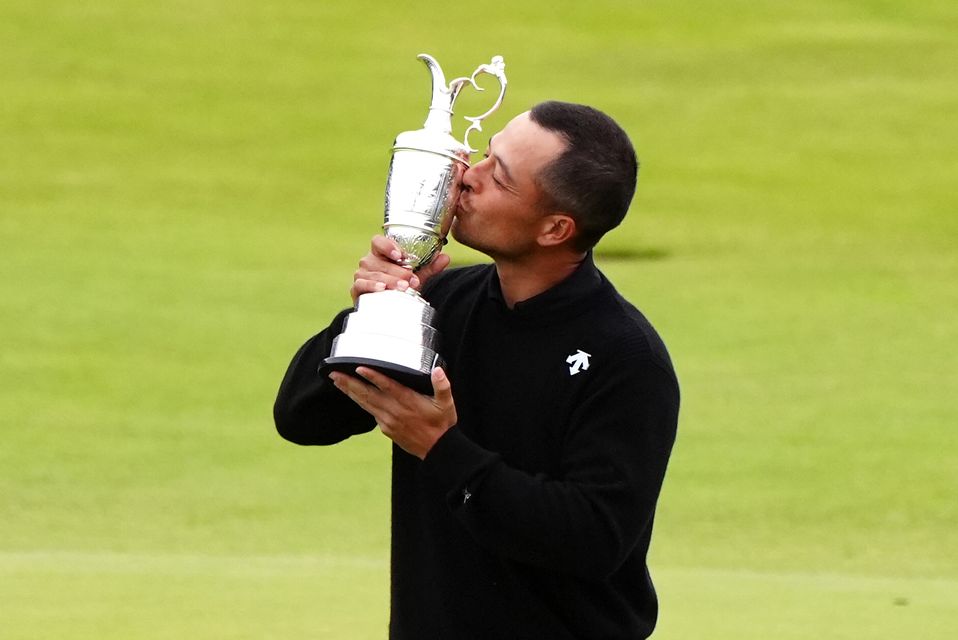 Xander Schauffele celebrates with the Claret Jug after winning the Open at Royal Troon (Jane Barlow/PA)