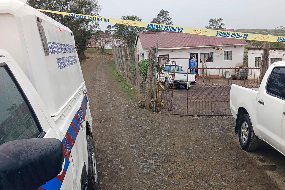 Police at the scene where 17 people were killed in two mass shootings (South African Police Services via AP/PA)