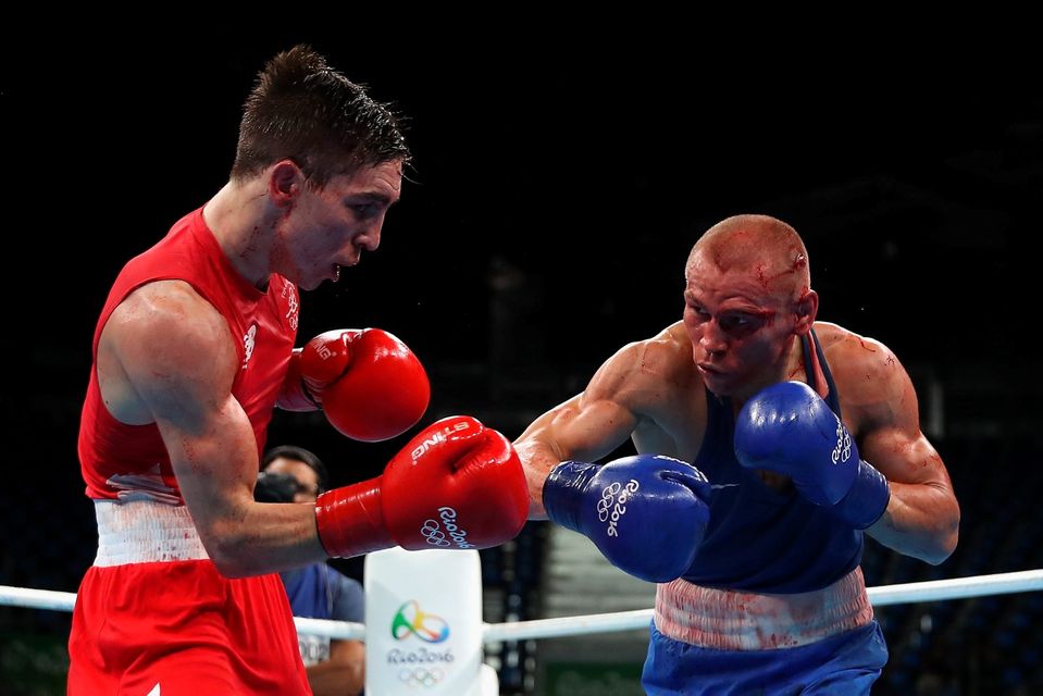 RIO DE JANEIRO, BRAZIL - AUGUST 16:  Vladimir Nikitin (R) of Russia fights Michael John Conlan of Ireland in the boxing  Men's Bantam (56kg) Quarterfinal 1 on Day 11 of the Rio 2016 Olympic Games at Riocentro on August 16, 2016 in Rio de Janeiro, Brazil.  (Photo by Christian Petersen/Getty Images)