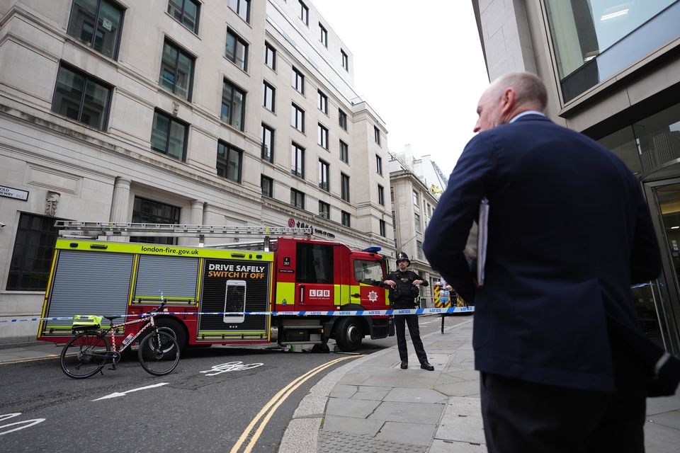 Firefighters in Old Jewry St in London after a fire broke out at the Lothbury restaurant (James Manning/PA)