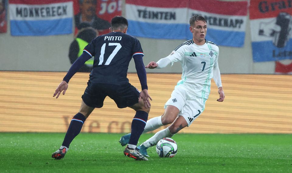 Northern Ireland’s Ethan Galbraith with Luxembourg’s Micheal Pinto 