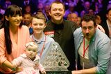 thumbnail: Mark Allen celebrates victory with wife Kyla, stepson Robbie, and baby Harleigh after his triumph in the Dafabet Master’s Final against Kyren Wilson