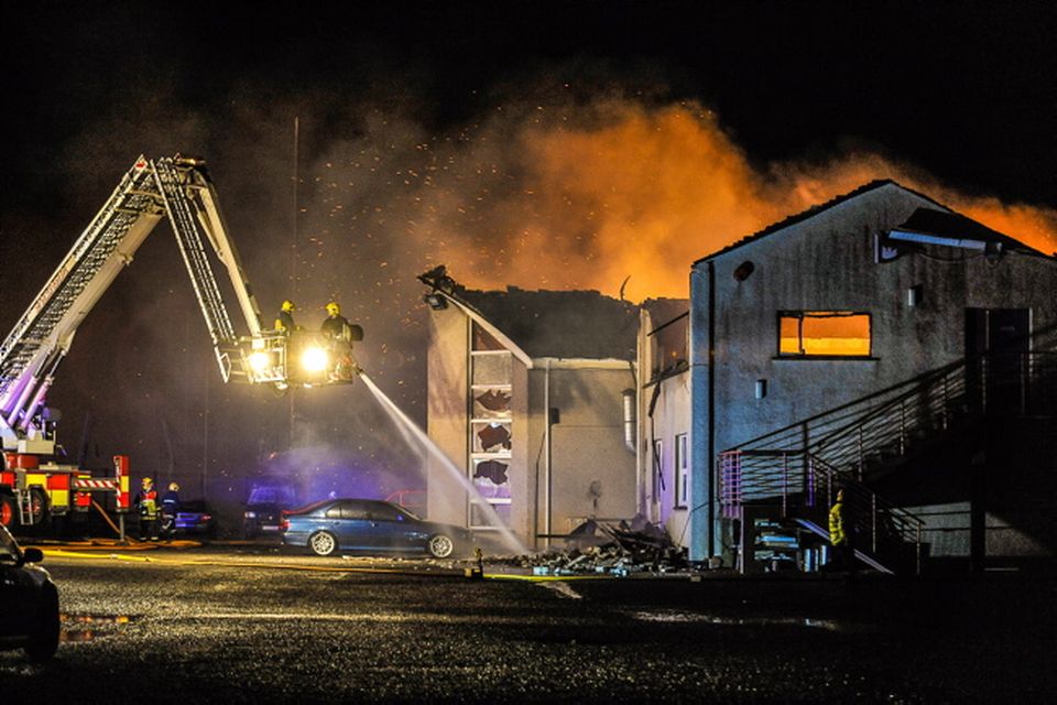 Firefighters battle the blaze at Carrickfergus Sailing Club last night
