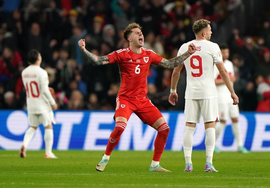 Joe Rodon, left, has become a big player for Wales (Joe Giddens/PA)