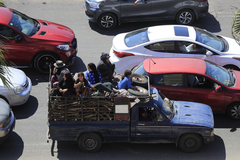 Cars sit in traffic as people flee the southern villages amid ongoing Israeli airstrikes, in Sidon, Lebanon (Mohammed Zaatari/AP)