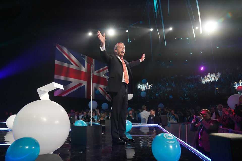 Nigel Farage speaking during Reform UK’s annual conference at the National Exhibition Centre in Birmingham (Joe Giddens/PA)