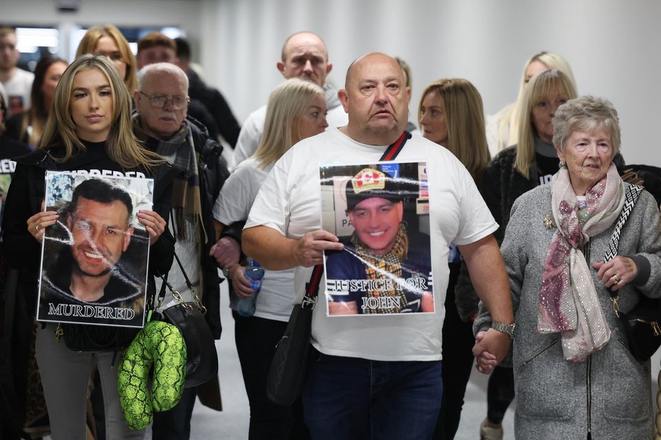 John George's family, with father Billy George in the centre, arrive home from Spain, pictured this afternoon at Belfast International Airport. Image: PressEye