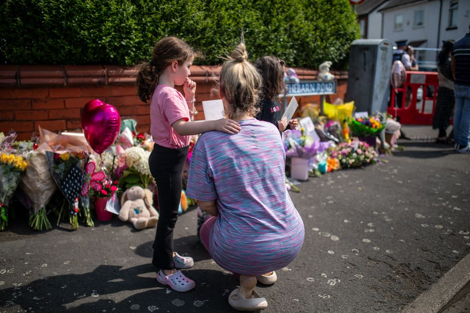 Families left tributes outside the police cordon after the attack (James Speakman/PA)