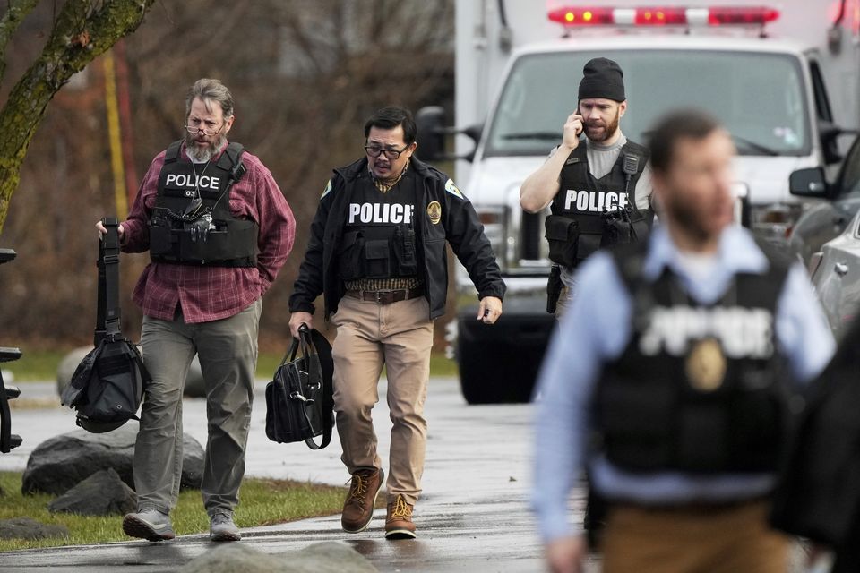 Police outside the Abundant Life Christian School (Morry Gash/AP)