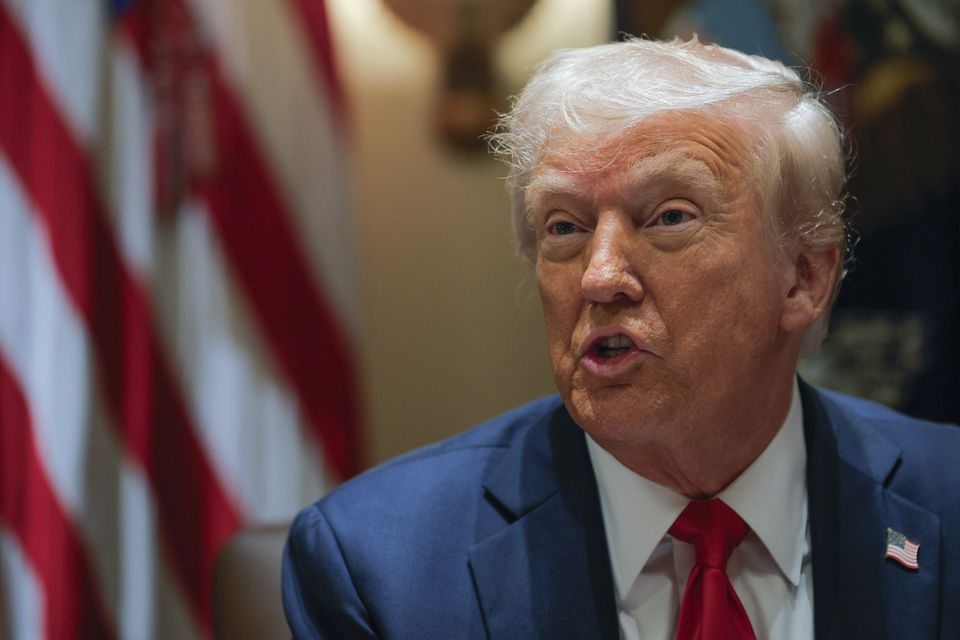 President Donald Trump speaks during a Cabinet meeting at the White House in Washington (Pool via AP)