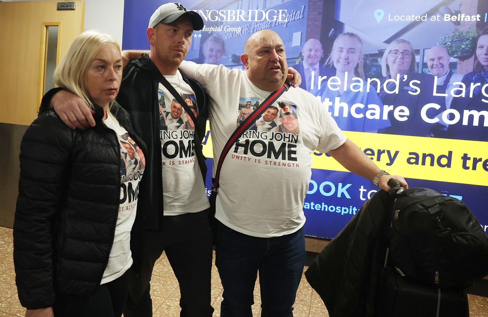 John George's family arrive home from Spain, pictured this afternoon at Belfast International Airport. Image: PressEye