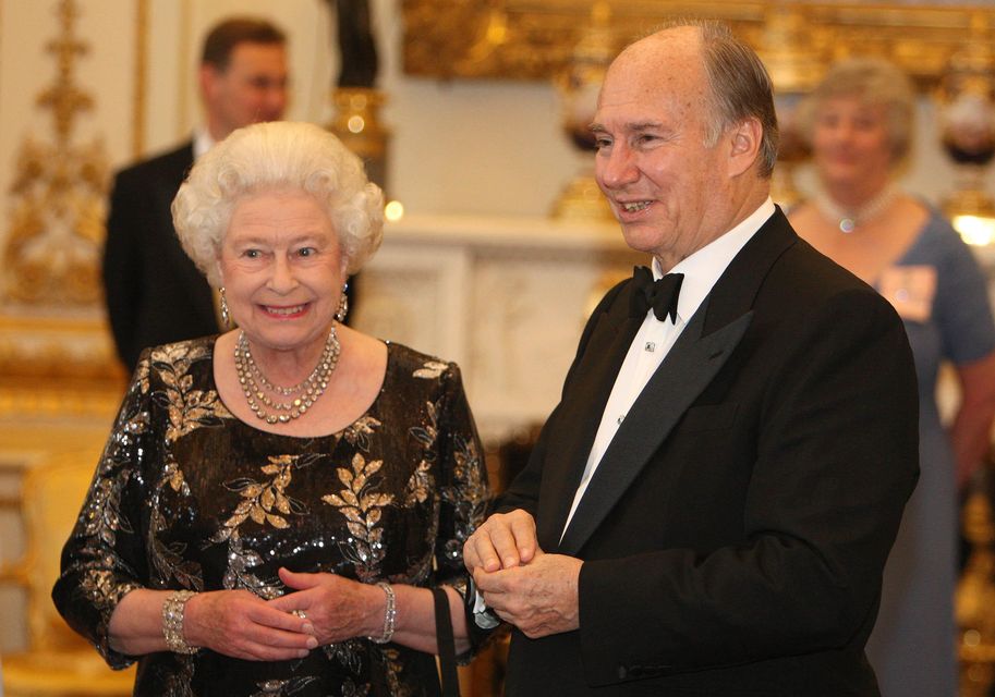 Queen Elizabeth II and the Aga Khan IV at a Buckingham Palace dinner in 2008 (Dominic Lipinski/PA)