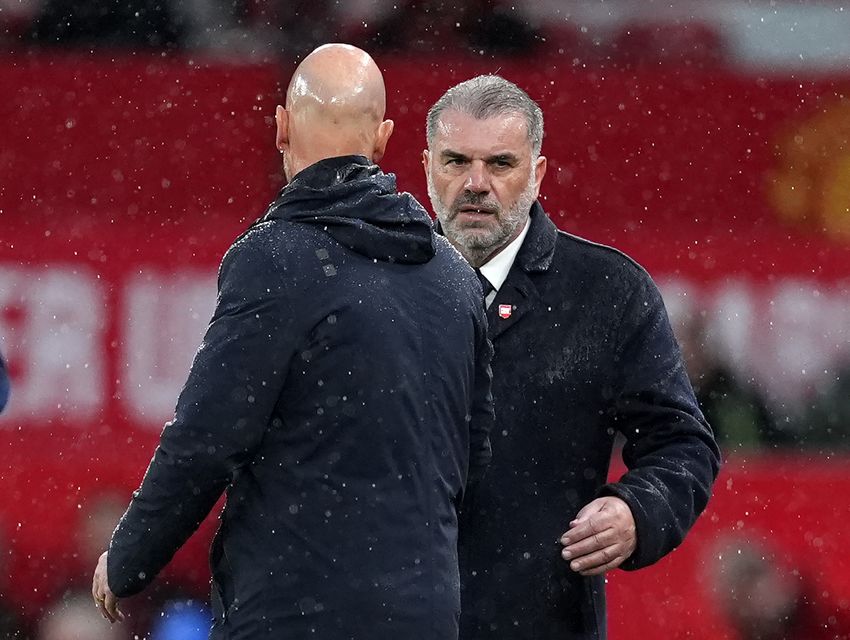 Ange Postecoglou shakes hands with Erik ten Hag (Martin Rickett/PA)