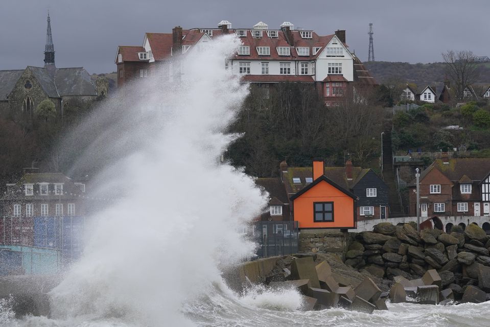 Giant waves crashing against the harbour wall in Folkestone, Kent (Gareth Fuller/PA)