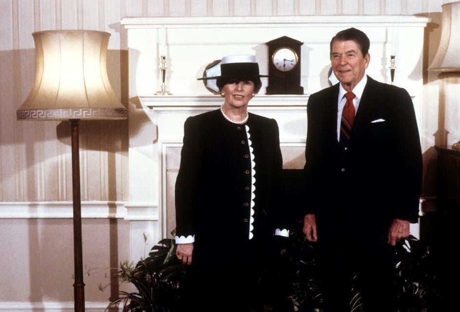 Ronald Reagan with Margaret Thatcher in London (PA)