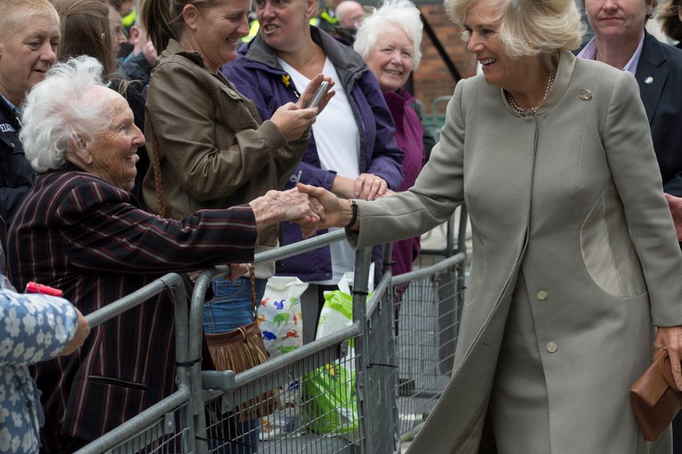 BELFAST, NORTHERN IRELAND - MAY 21:  Patron of The Big Lunch Camilla, Duchess of Cornwall greets well wishers on May 21, 2015 in Belfast, Northern Ireland. Prince Charles, Prince of Wales and Camilla, Duchess of Cornwall will attend a series of engagements in Northern Ireland following their two day visit in the Republic of Ireland.  (Photo by Arthur Edwards  - WPA Pool/Getty Images)