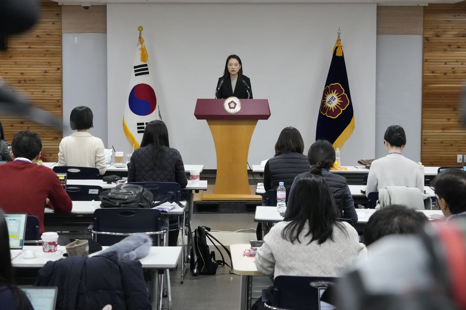 Lee Jin, spokeswoman of the South Korean Constitutional Court, speaks during a press conference (Ahn Young-joon/AP)