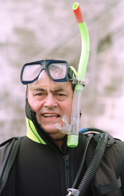 John Prescott diving off the coast of Northumberland in 1997 (PA)