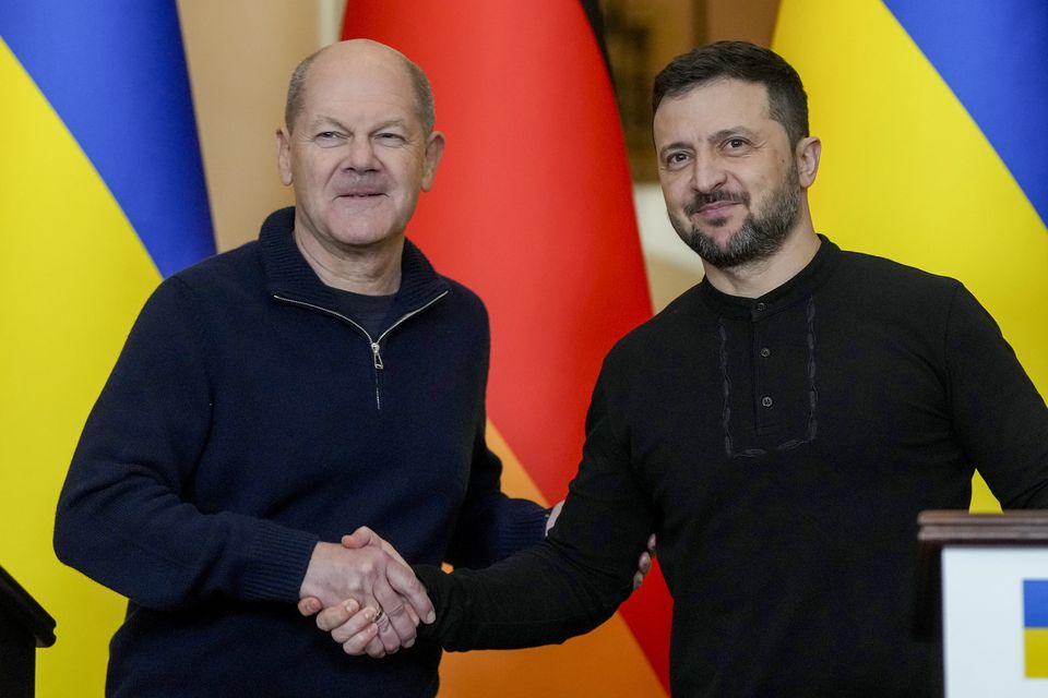 Ukraine’s President Volodymyr Zelensky, right, and German Chancellor Olaf Scholz (Evgeniy Maloletka/AP)