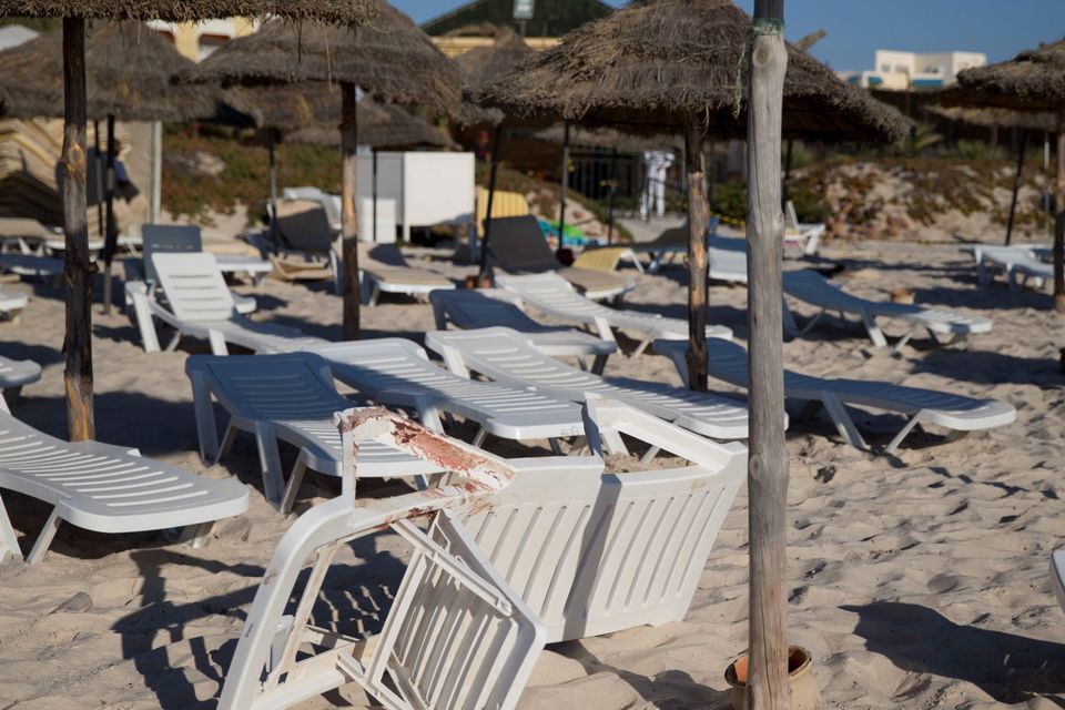 Blood stains are seen on a deckchair at the beach of the Riu Imperial Marhaba Hotel in Port el Kantaoui, on the outskirts of Sousse south of the capital Tunis, on June 27, 2015, in the aftermath of a shooting attack on the beach resort claimed by the Islamic State group. The IS group on June 27 claimed responsibility for the massacre in the seaside resort that killed nearly 40 people, most of them British tourists, in the worst attack in the country's recent history. AFP PHOTO / KENZO TRIBOUILLARDKENZO TRIBOUILLARD/AFP/Getty Images