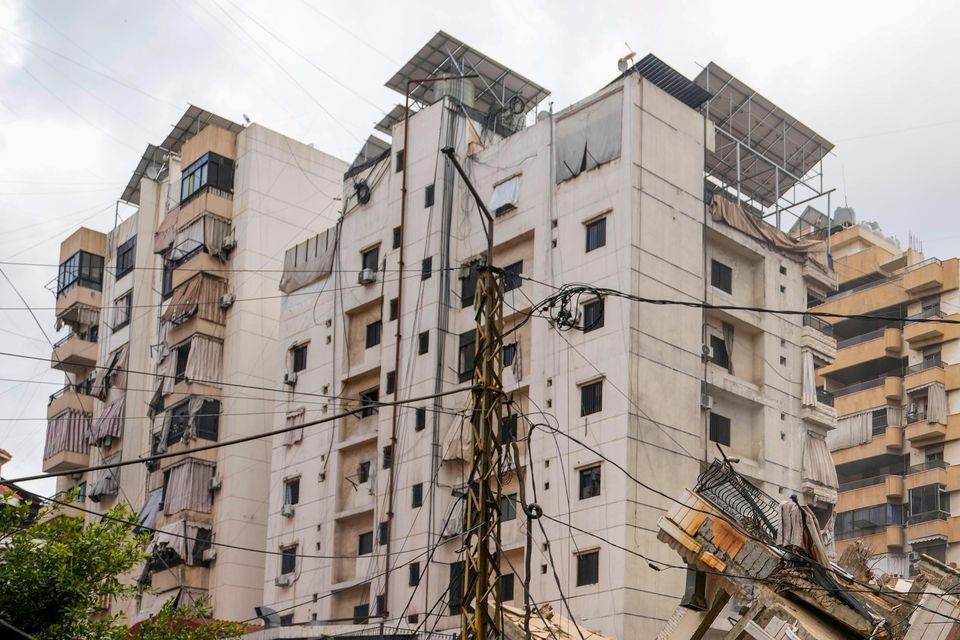 A damaged building at the site of an Israeli airstrike in Beirut (Hassan Ammar/AP)