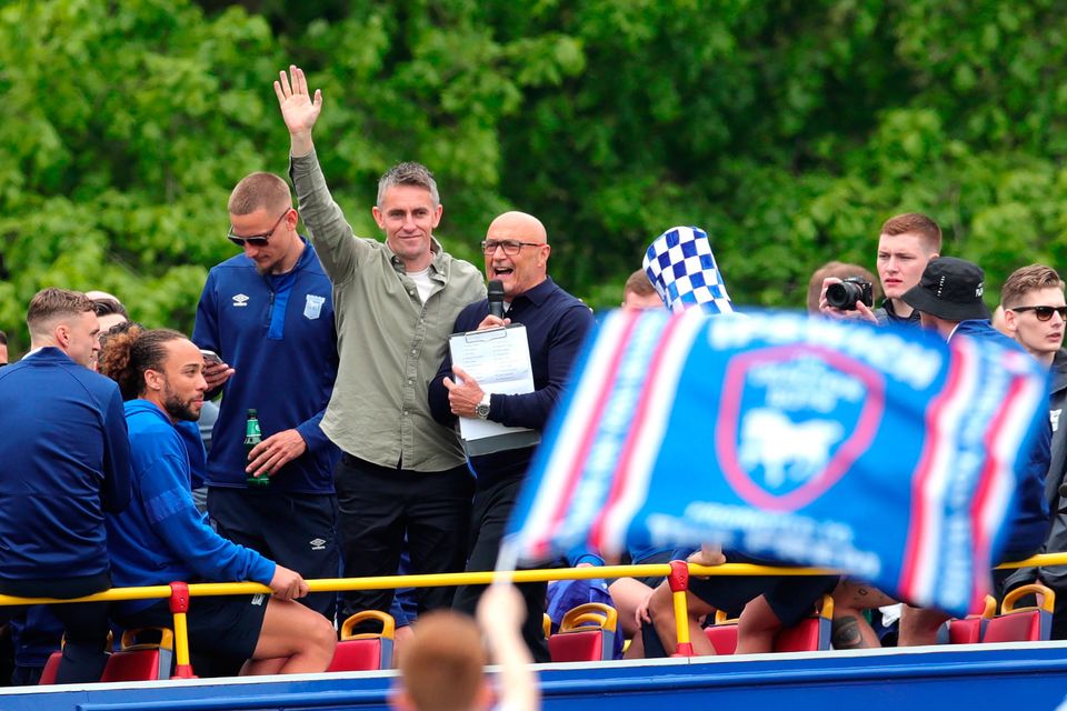Ipswich Town manager Kieran McKenna during an open-top bus parade in Ipswich to celebrate promotion to the Premier League. Pic: Chris Radburn
