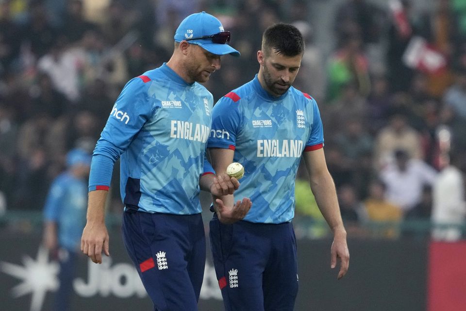 Mark Wood, right, will almost certainly miss England’s last Champions Trophy match because of a left knee injury (K.M. Chaudary/AP)