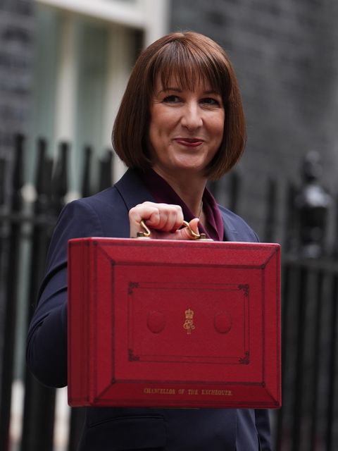 Chancellor Rachel Reeves leaves 11 Downing Street with her ministerial red box before delivering her Budget in the Commons (Jordan Pettitt/PA)