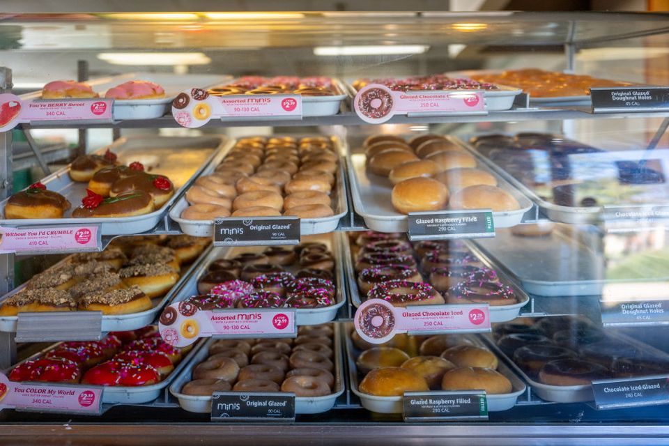 AUSTIN, TEXAS - FEBRUARY 13: Doughnuts are displayed for sale at a Krispy Kreme store on February 13, 2024 in Austin, Texas. Krispy Kreme Inc. today announced expected double-digit price increases in response to commodities and labor cost pressures. The Charlotte, North Carolina-based company's stock price fell by as much as 10% earlier after earnings guidance for the full year missed analysts' estimates.  (Photo by Brandon Bell/Getty Images)