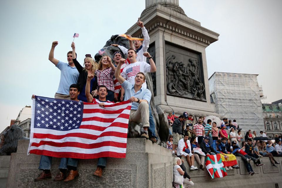 LONDON, ENGLAND - JULY 27:  United States' fans celebrate the openning of the London 2012 Olympic Games at Trafalgar Square on July 27, 2012 in London, England.  (Photo by Feng Li/Getty Images)